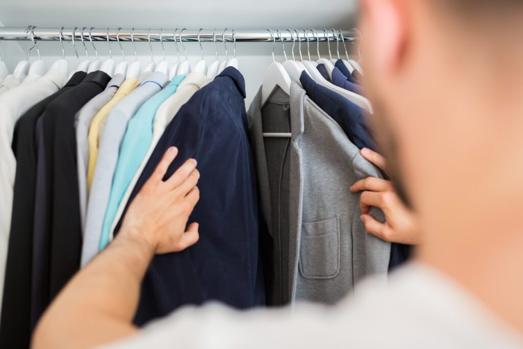 man-choosing-clothes-in-his-wardrobe